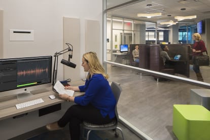 College private office looking out to open space built with modular glass walls