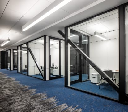 Higher education student center meeting rooms with glass dividers and prefab walls
