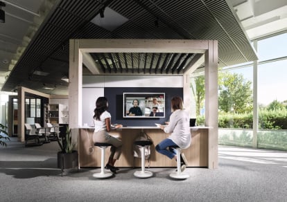 Timber canopy installation shown in an open collaborative space