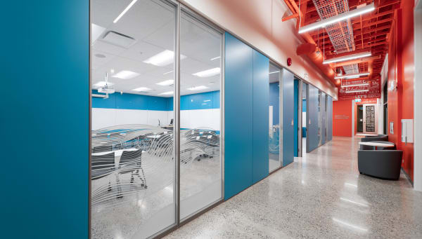 Hallway of college campus made with modular center mount glass walls