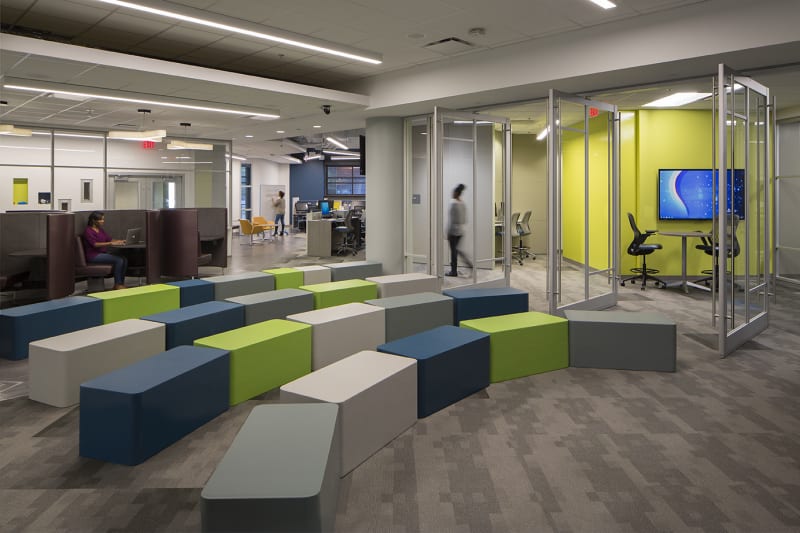 Modern college campus open floorplan interior with glass walls