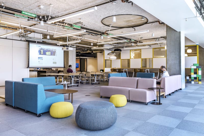 Tech-enabled college open space with modular walls with glass