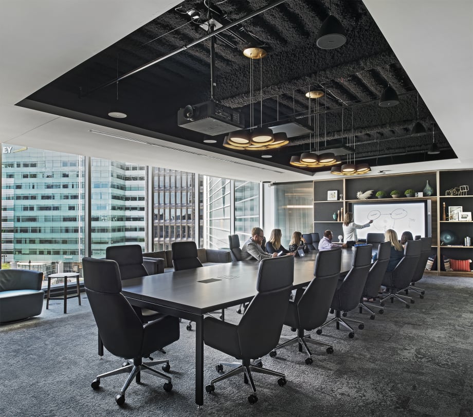 This meeting room features a custom casework shelf at one end to house the room's technology.