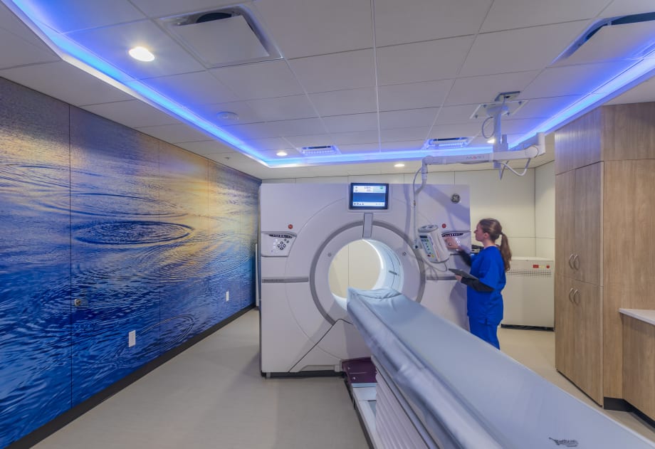 Image of graphic wall panels going across a MRI room with calming artwork applied