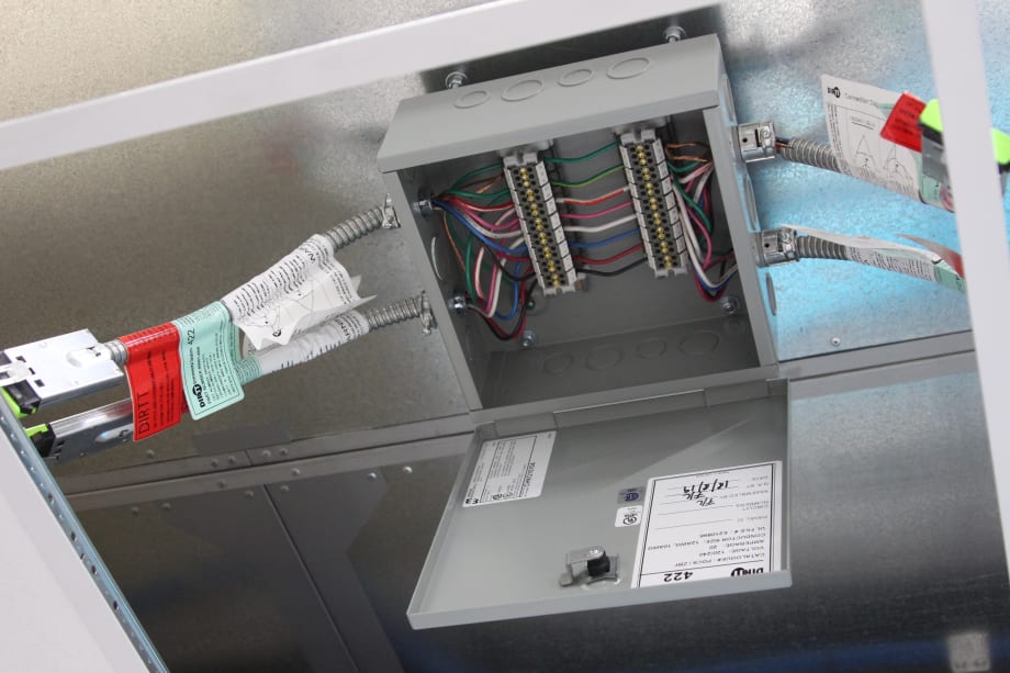 Image of modular electric cabling going into a box.