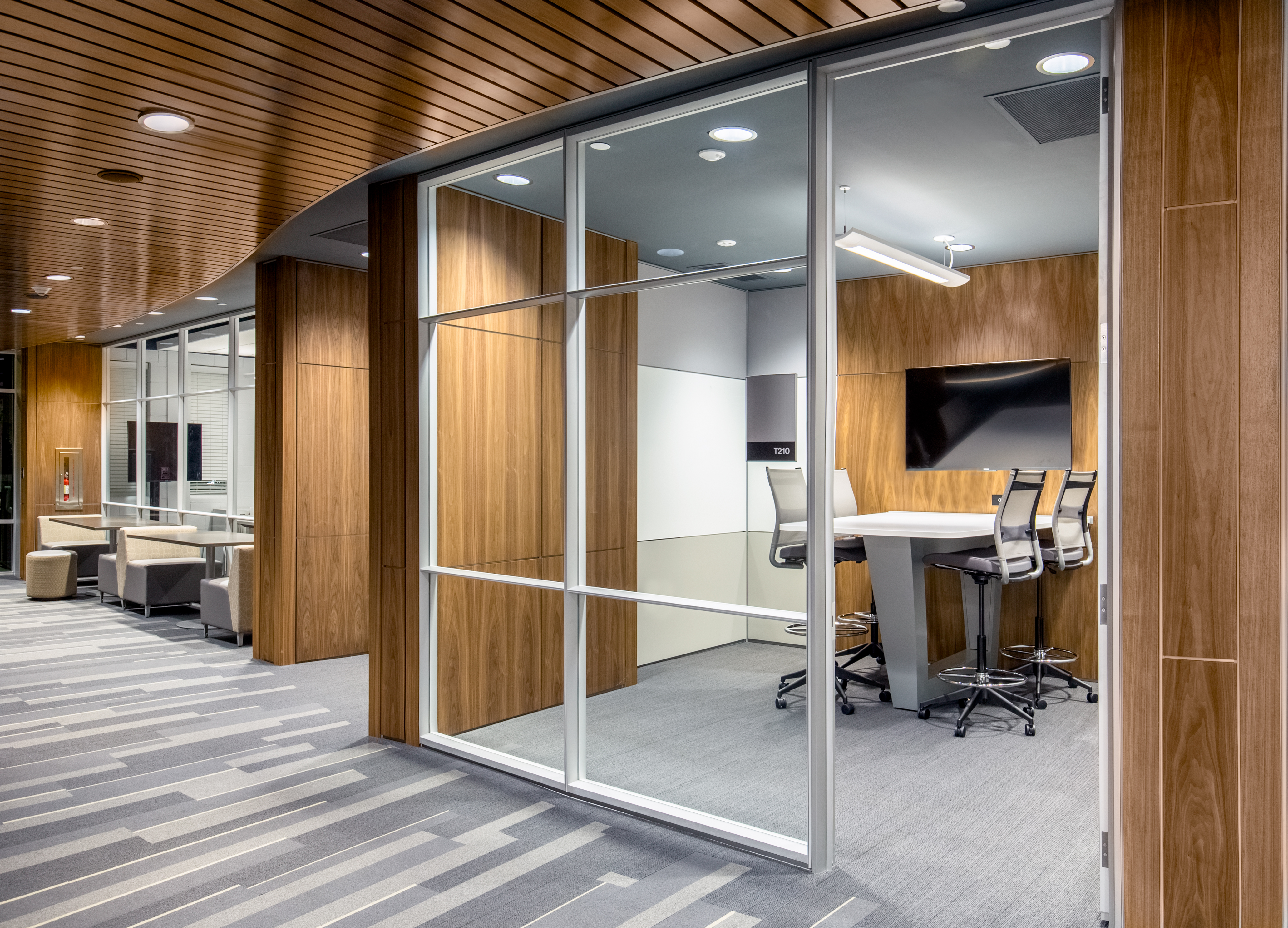 Christian school collaboration areas featuring prefab modular walls with center mount glass and integrated technology