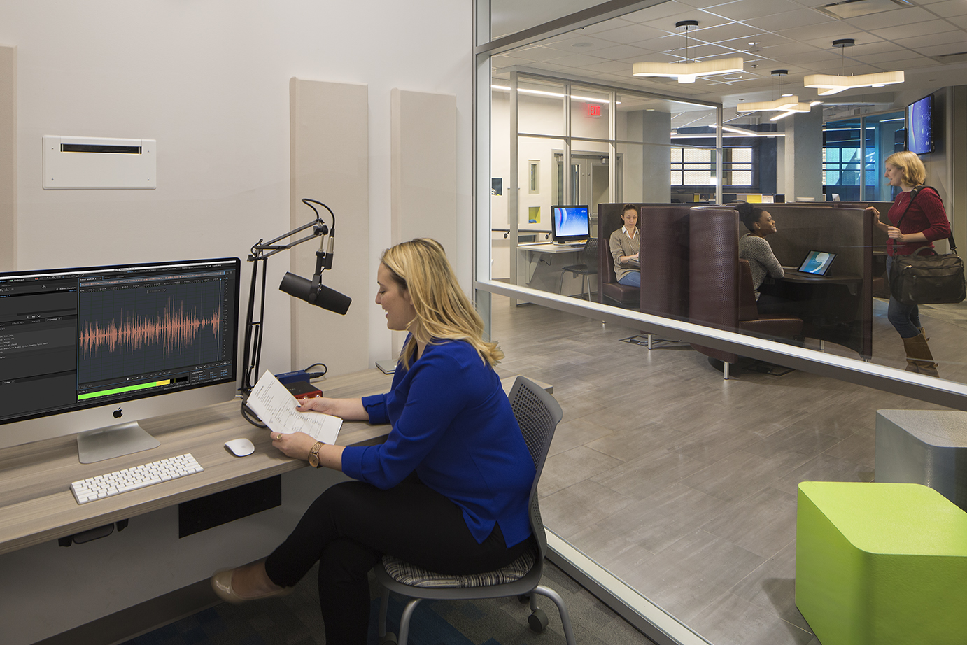 College private office looking out to open space built with modular glass walls