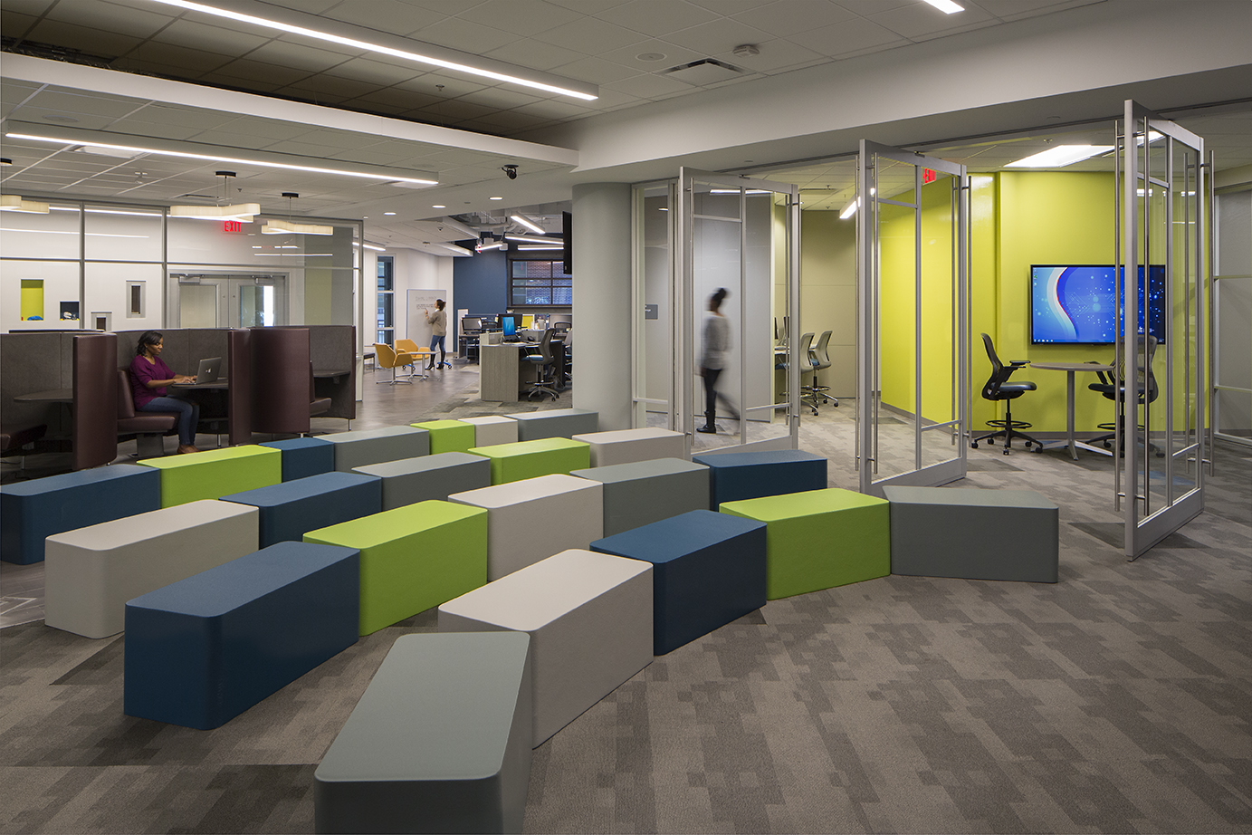 Modern college campus open floorplan interior with glass walls