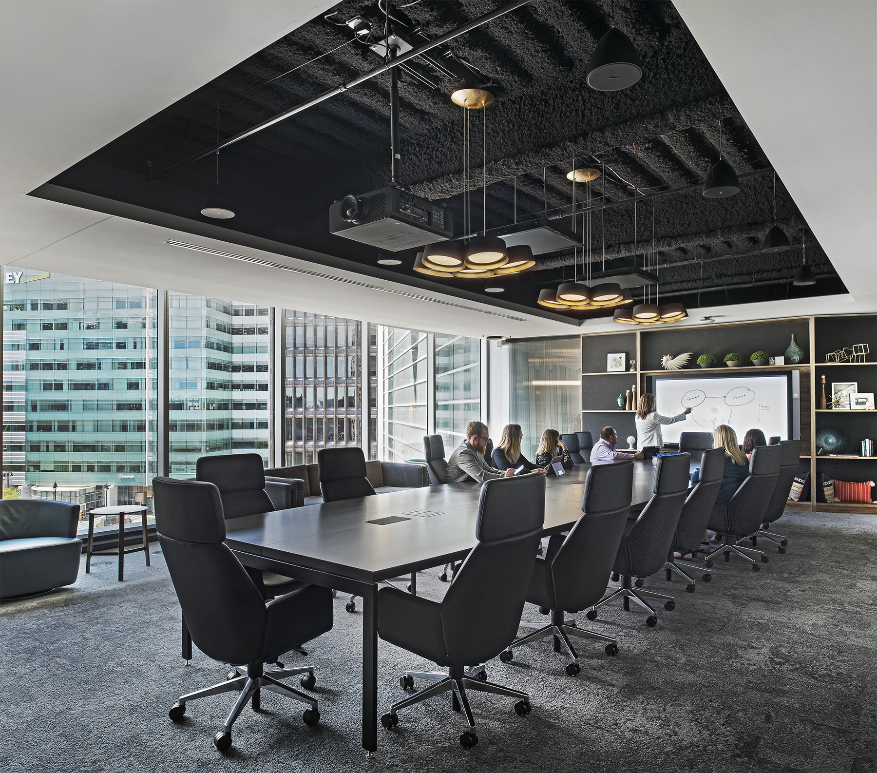 This meeting room features a custom casework shelf at one end to house the room's technology.