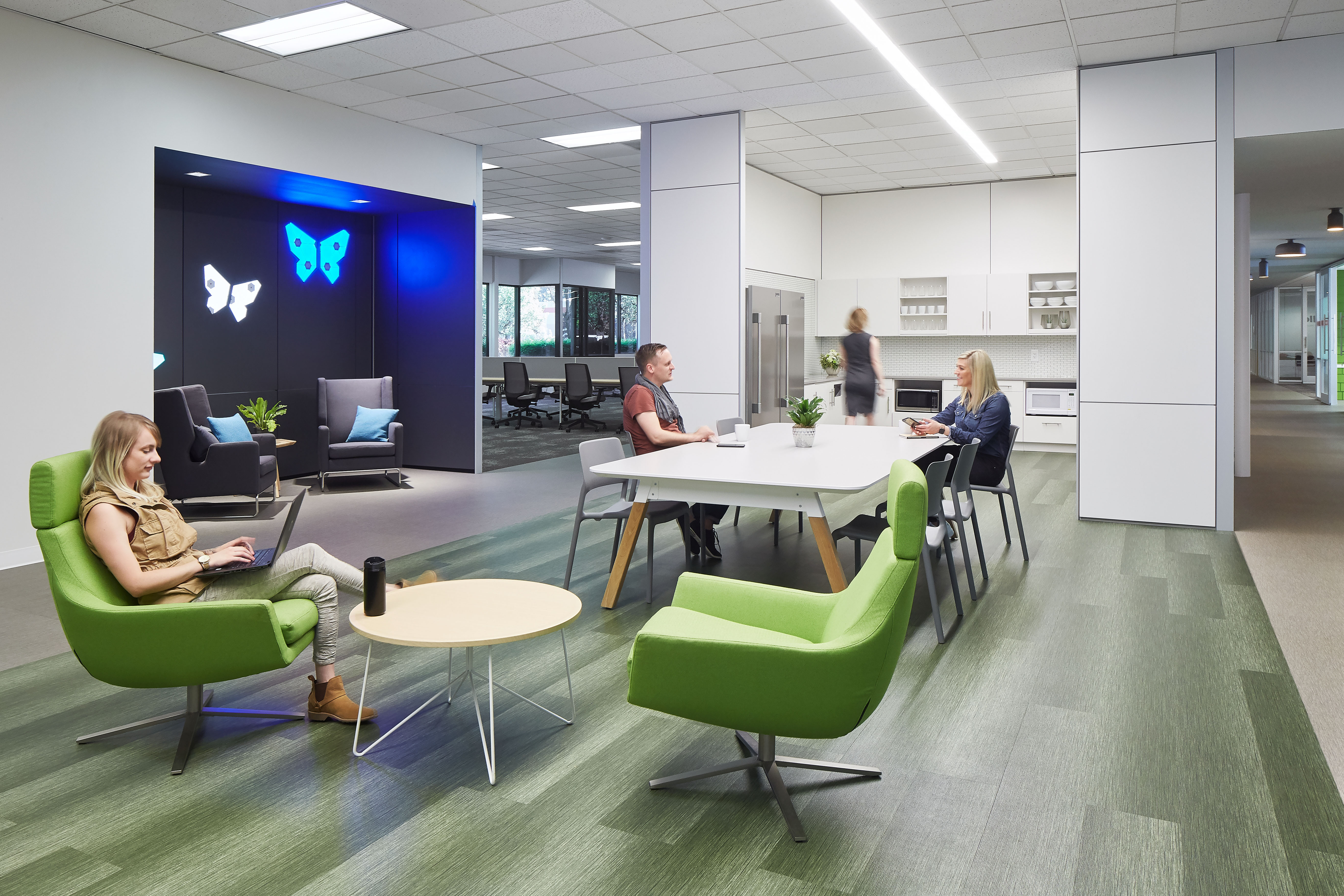A kitchen area featuring DIRTT's solid modular walls and casework cabinetry.