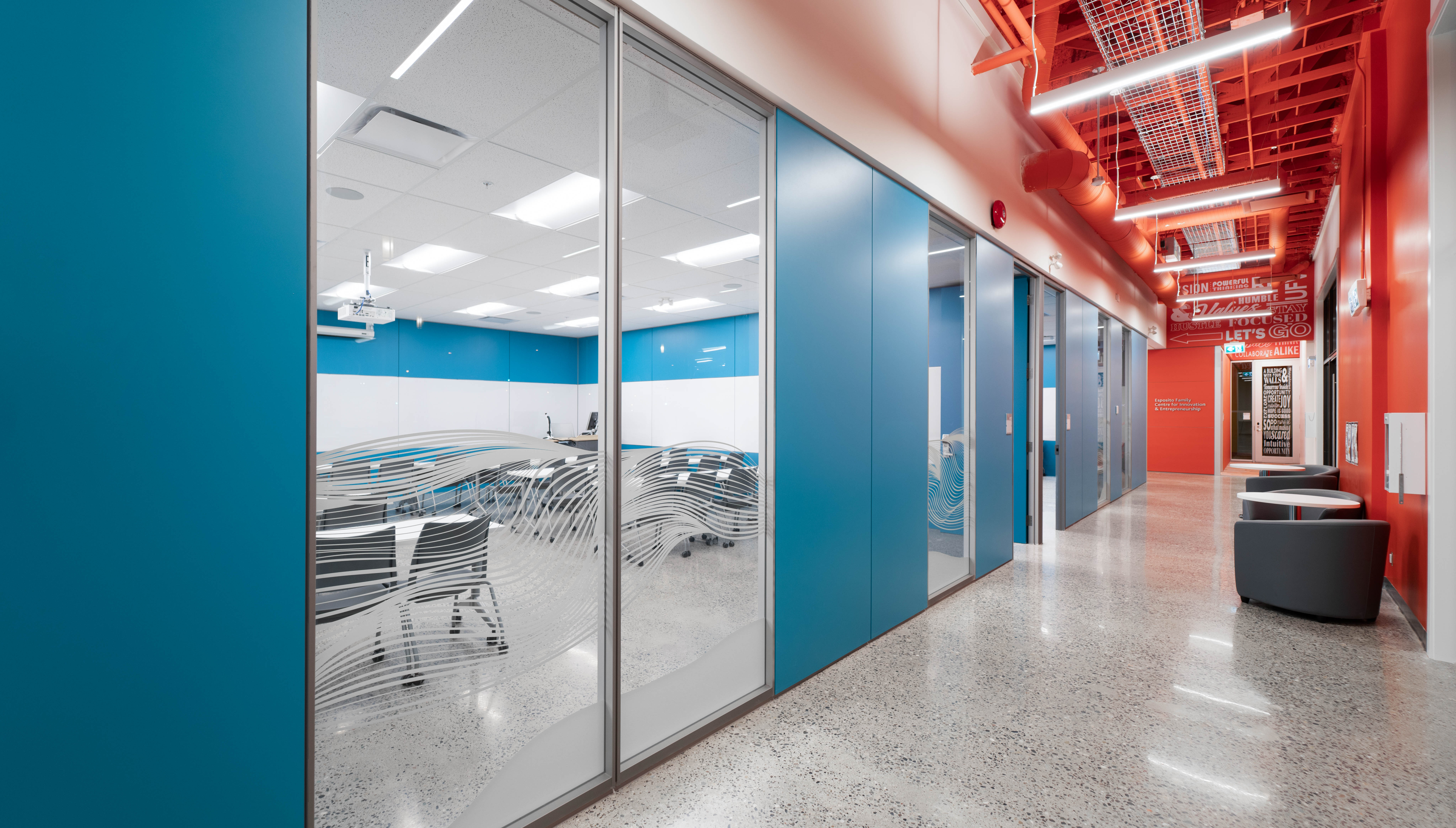 Hallway of college campus made with modular center mount glass walls