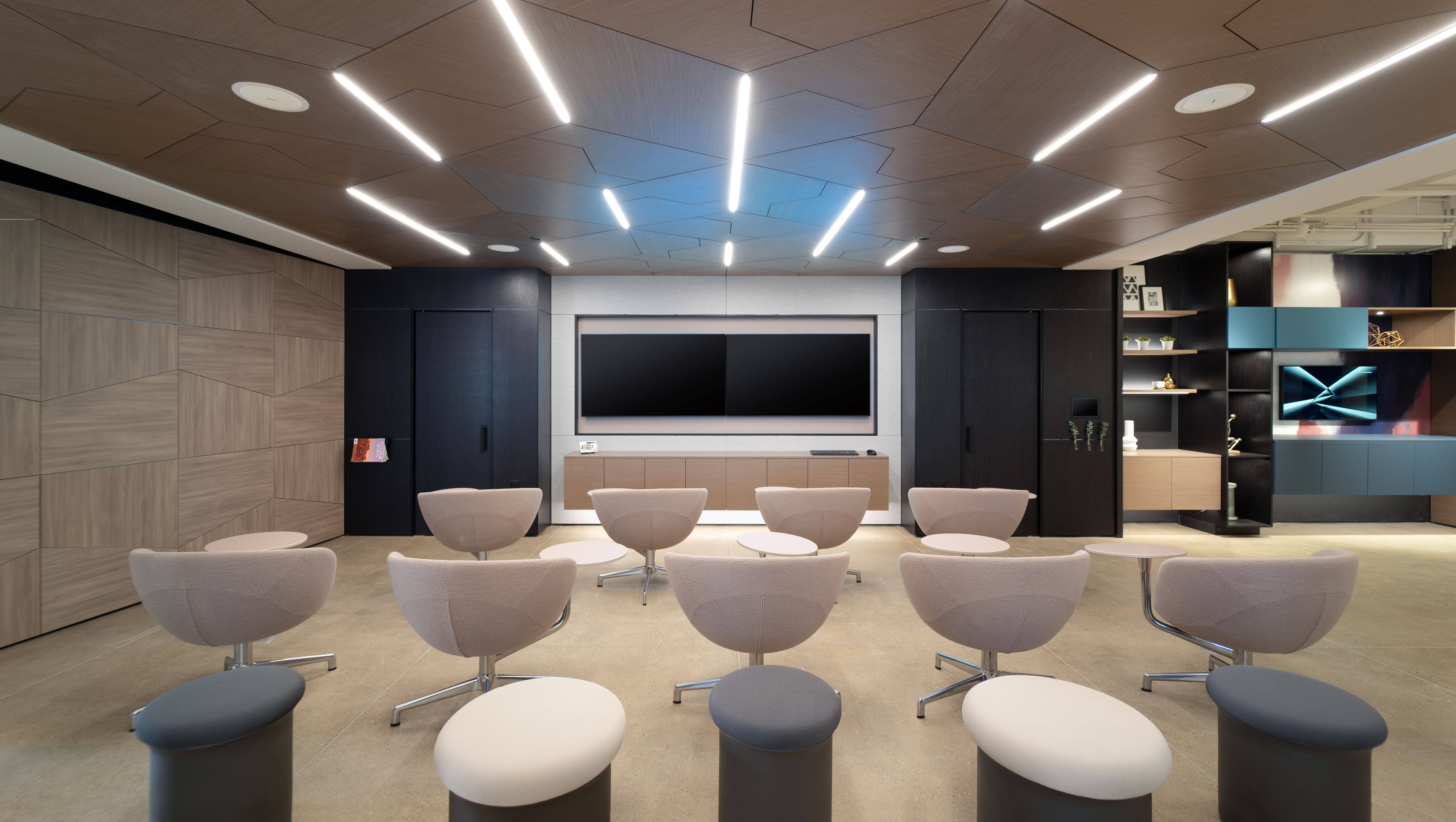 This DIRTT classroom is fitted with custom casework cabinets and shelves, DIRTT's solid wall system and integrated display.