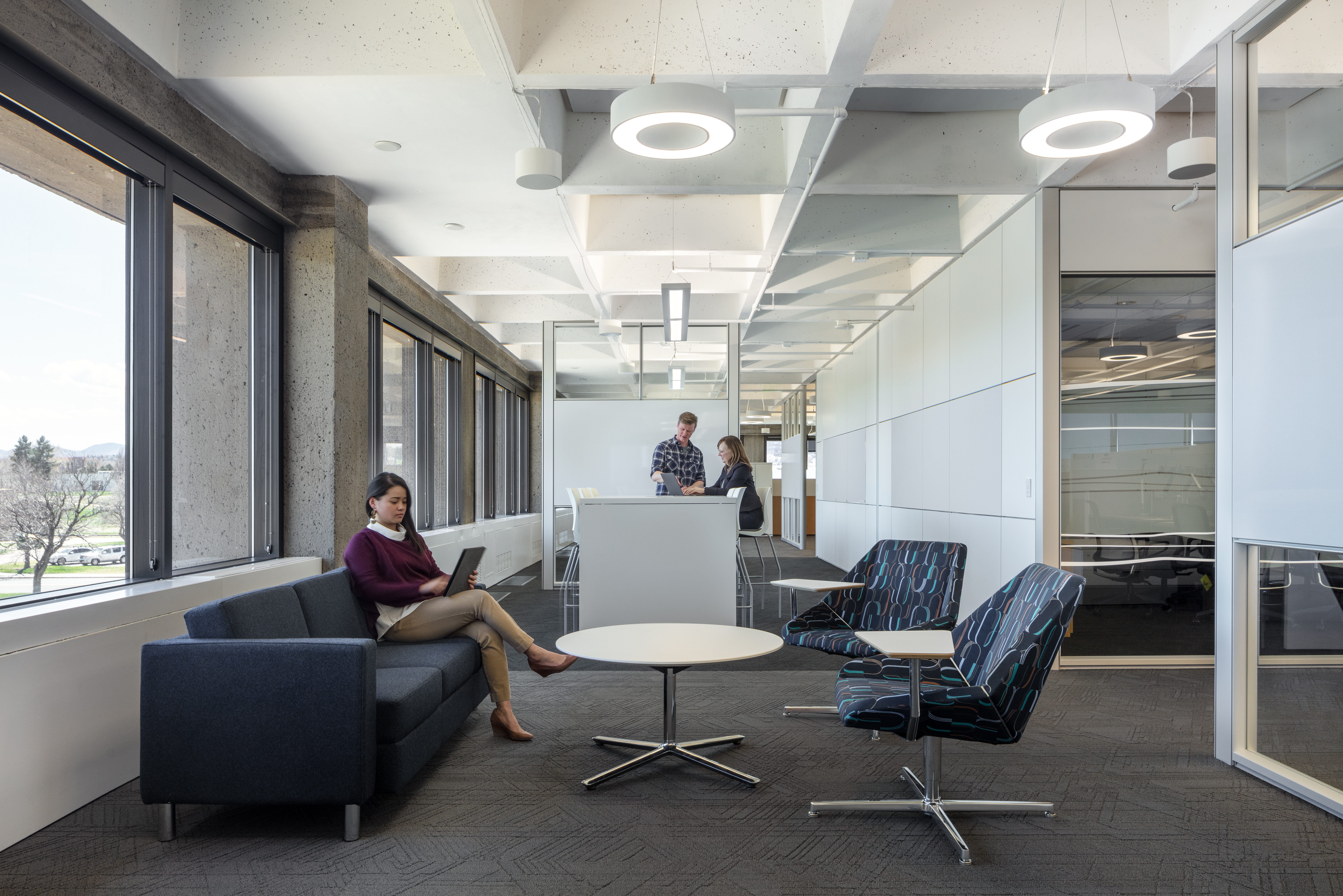 Federal office building open space with raised floor system, prefab office walls with modular glass walls