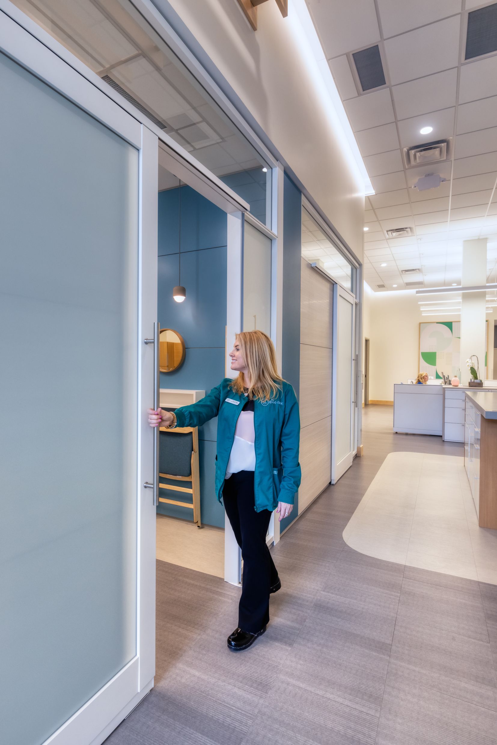 Integrated sliding door in a healthcare setting