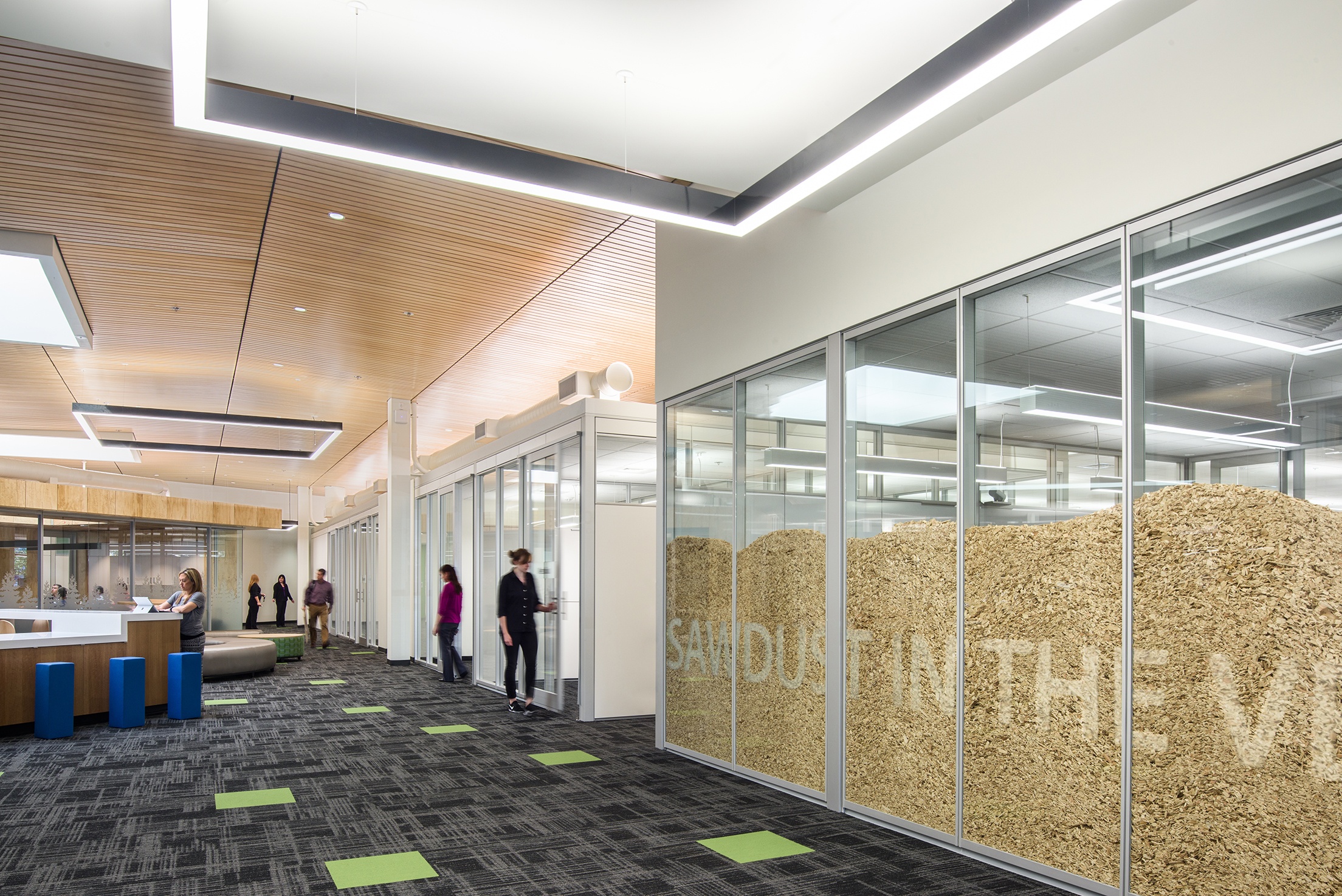 Image of an office space built using a modular double pane glass wall system