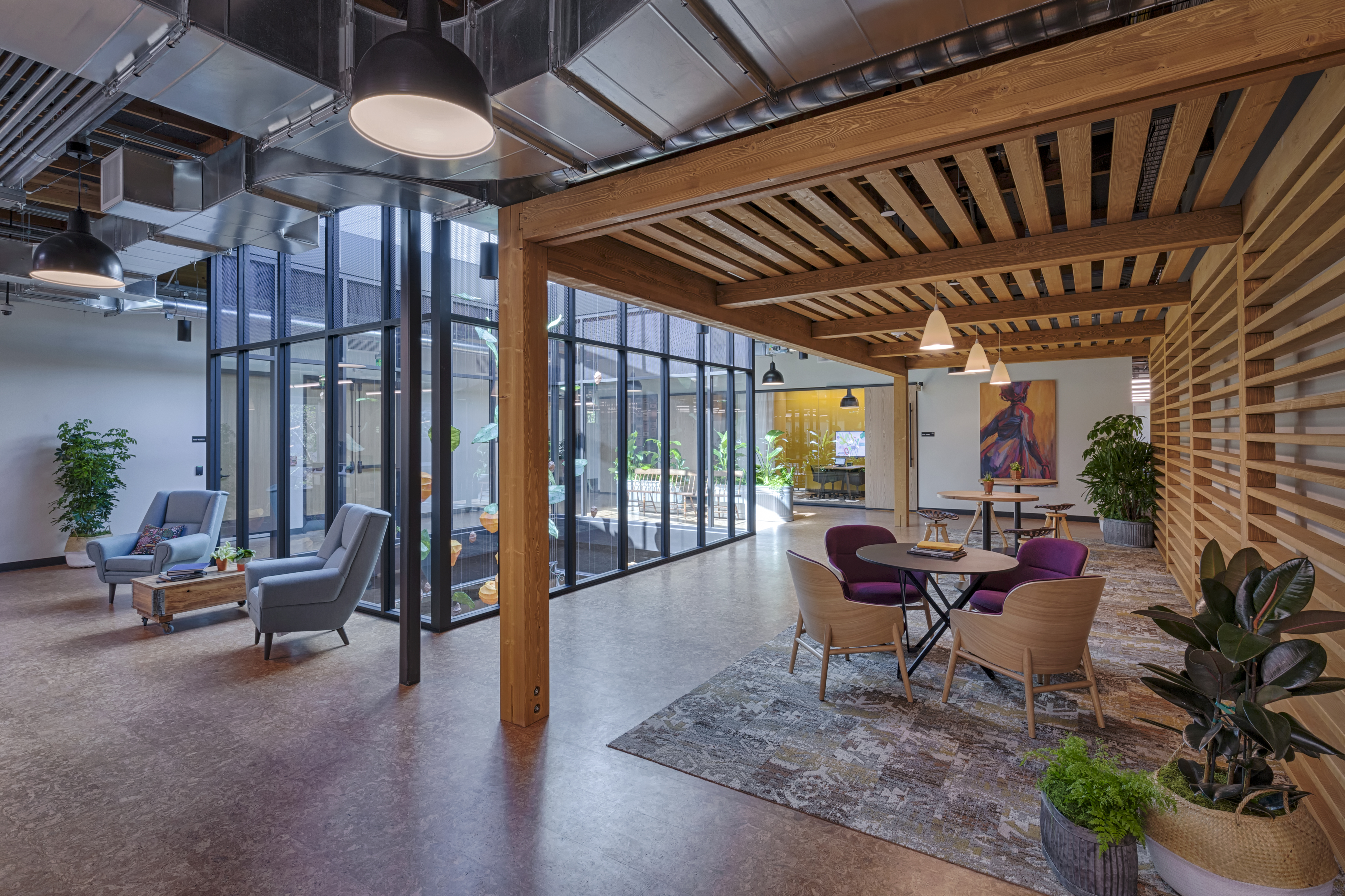 A warm Timber canopy from over a seating area in Google's Crossman space.