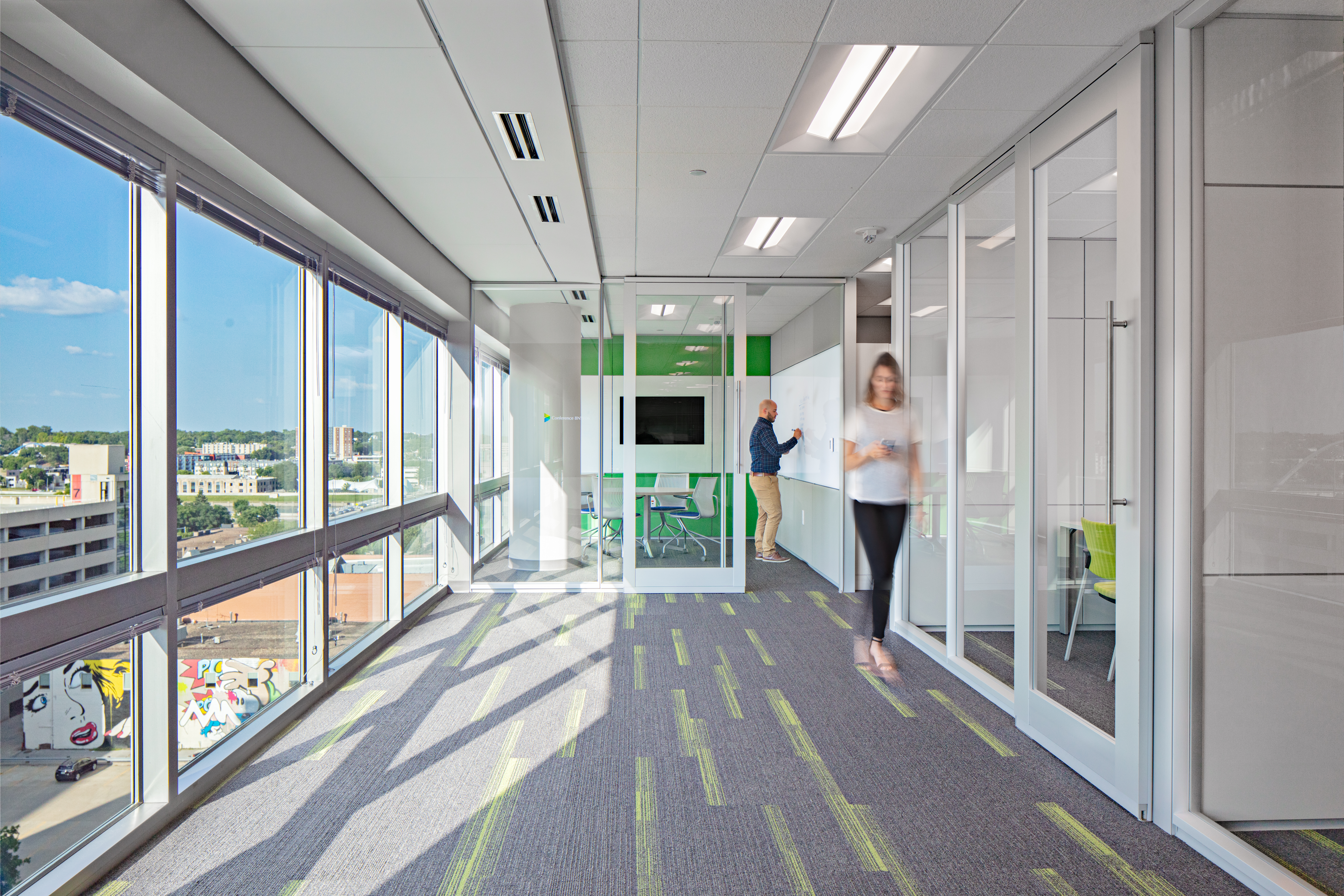 Image of a sliding interior door integrated with a glass wall