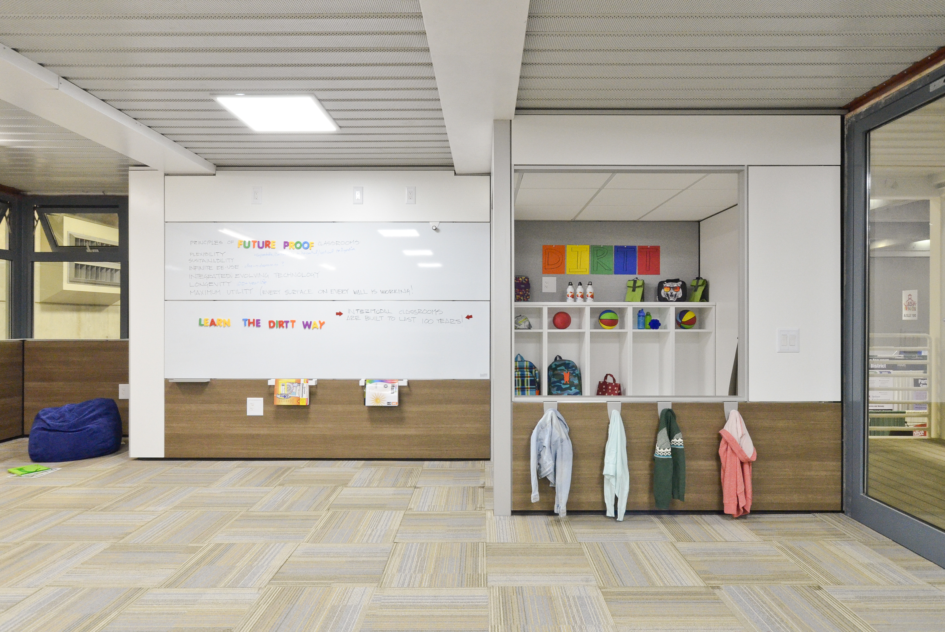 Image of two large writable wall surfaces in a classroom environment