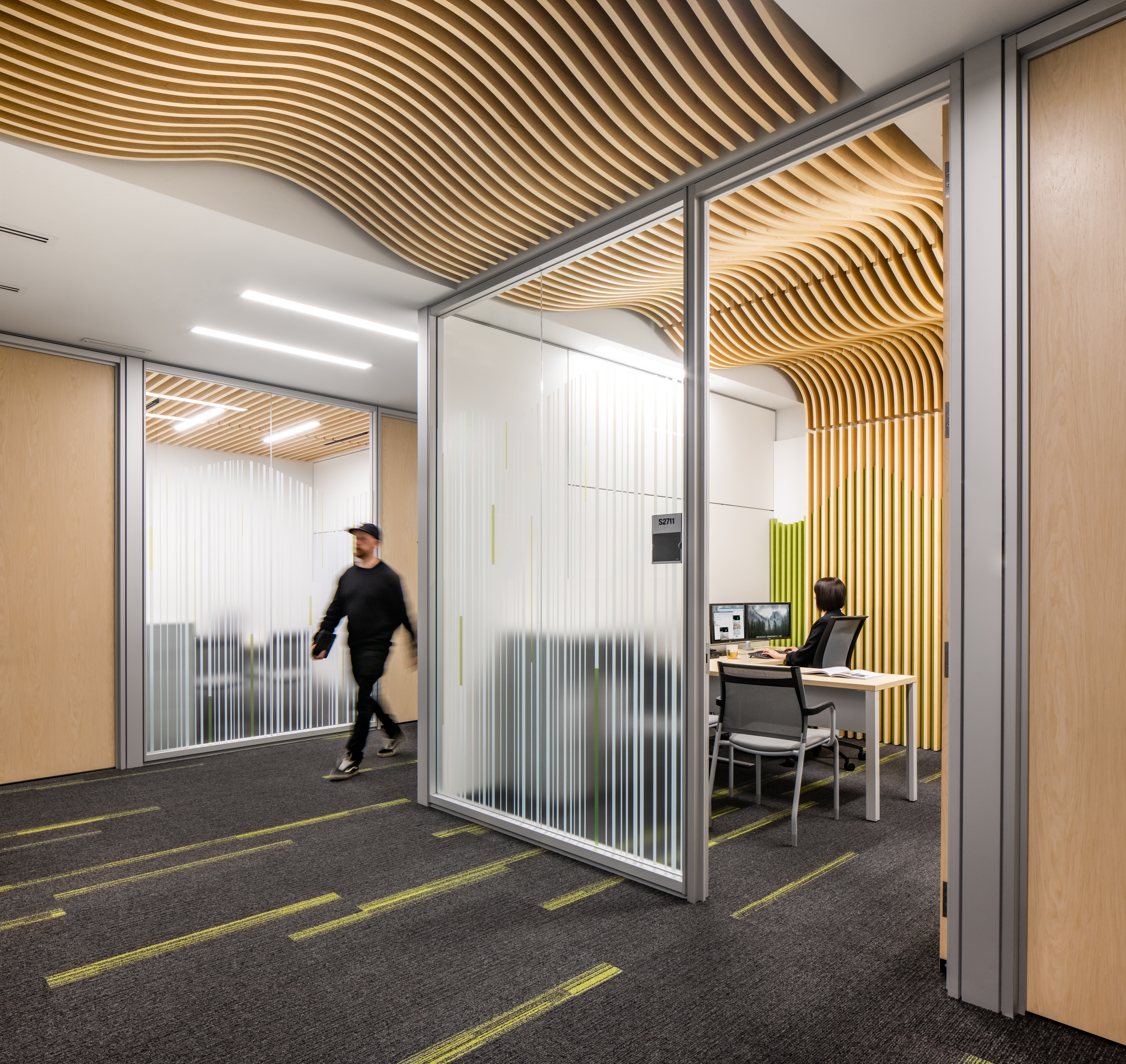 College student centre with prefab construction modular walls, swing doors, and custom graphics