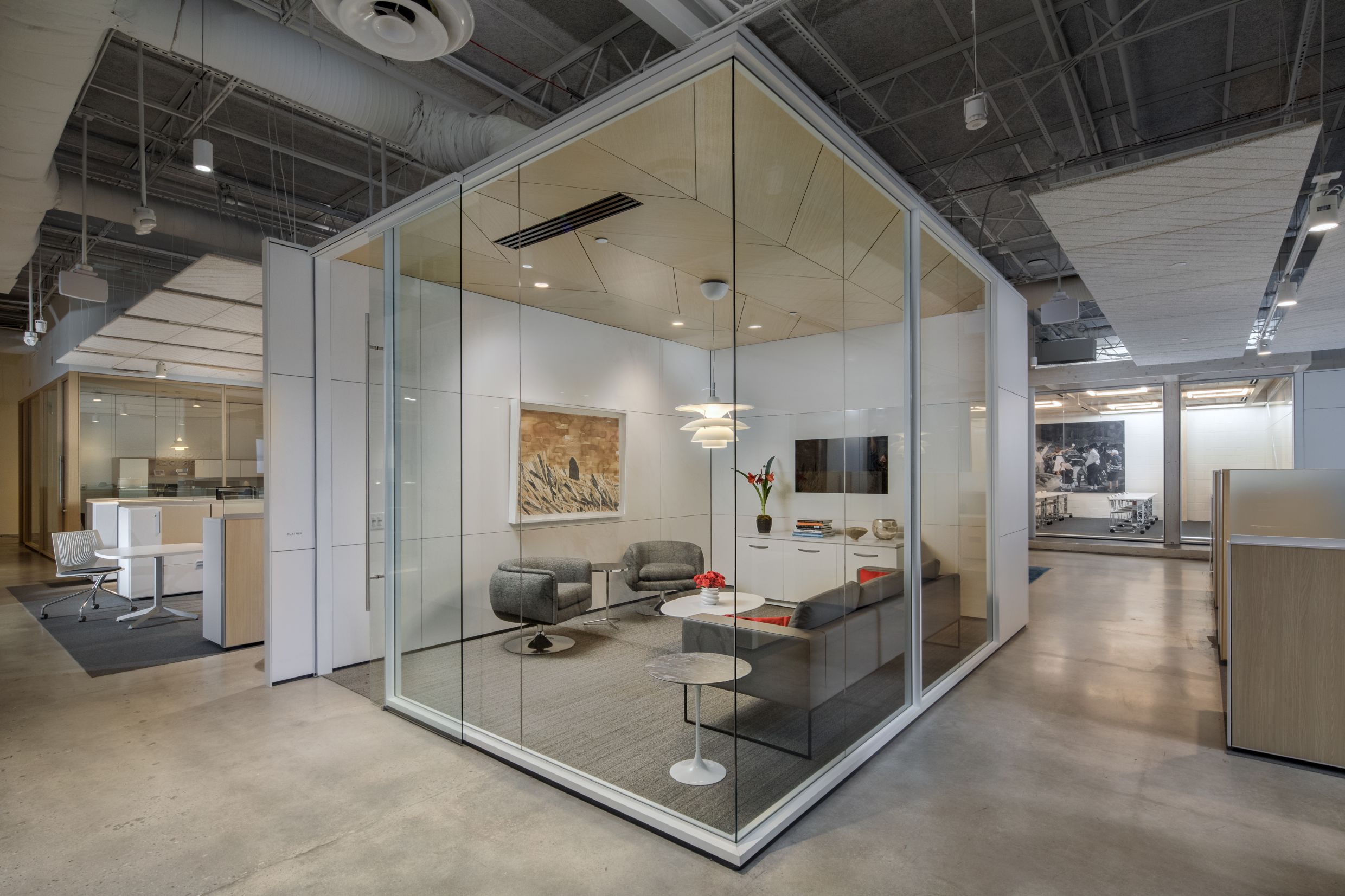 Meeting room utilizing modular glass walls to let the light in.