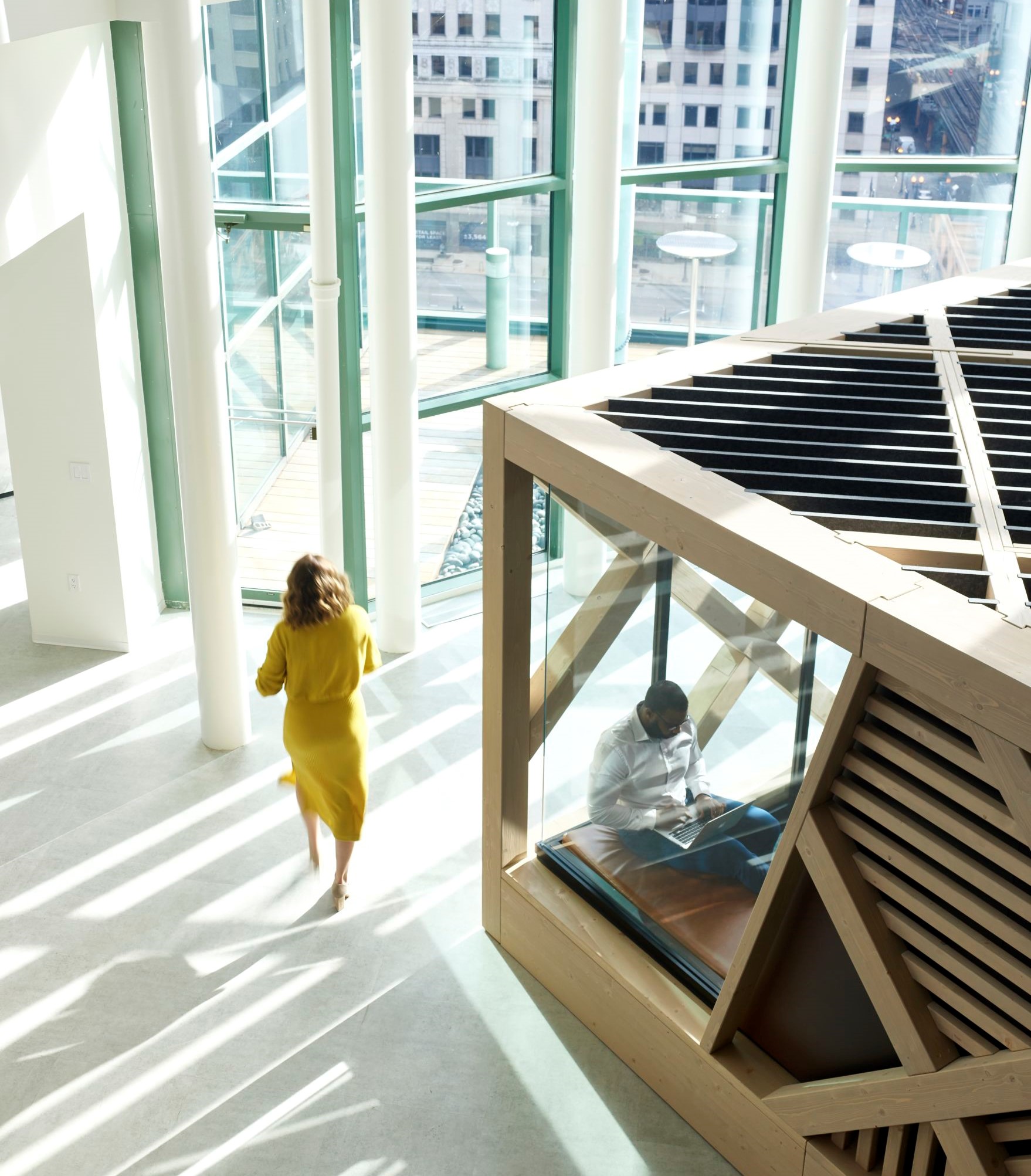 Meeting room surrounded by timber adding visual interest, warmth and privacy.