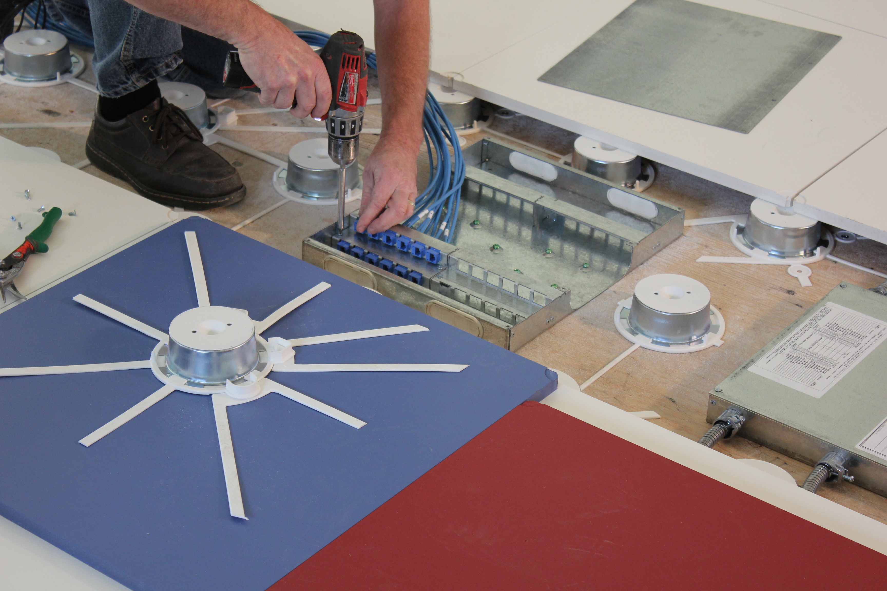 Image of a modular fiber optic system being installed.